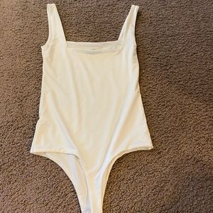 White fashionova silk bodysuit